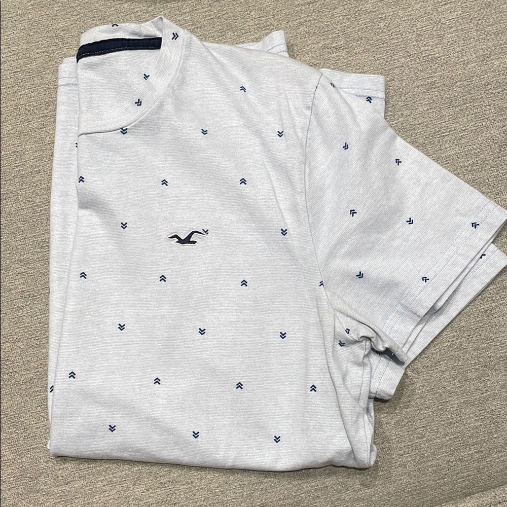 Men’s Hollister Light Blue T-Shirt with small arrow designs